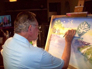 Artist, R. D. Burton painting a watercolor